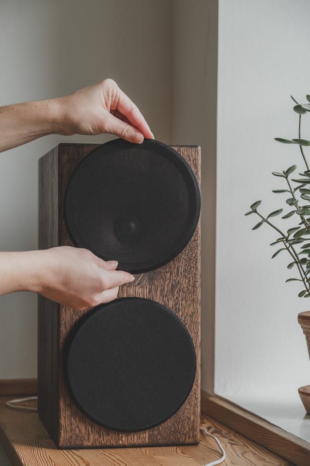 An E50 in dark oak with its round grilles