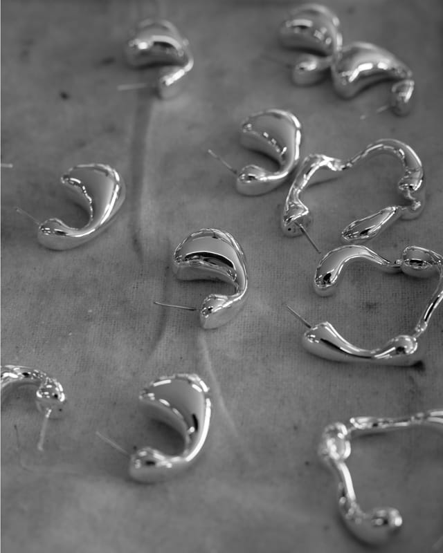 Sterling silver earrings in the workshop