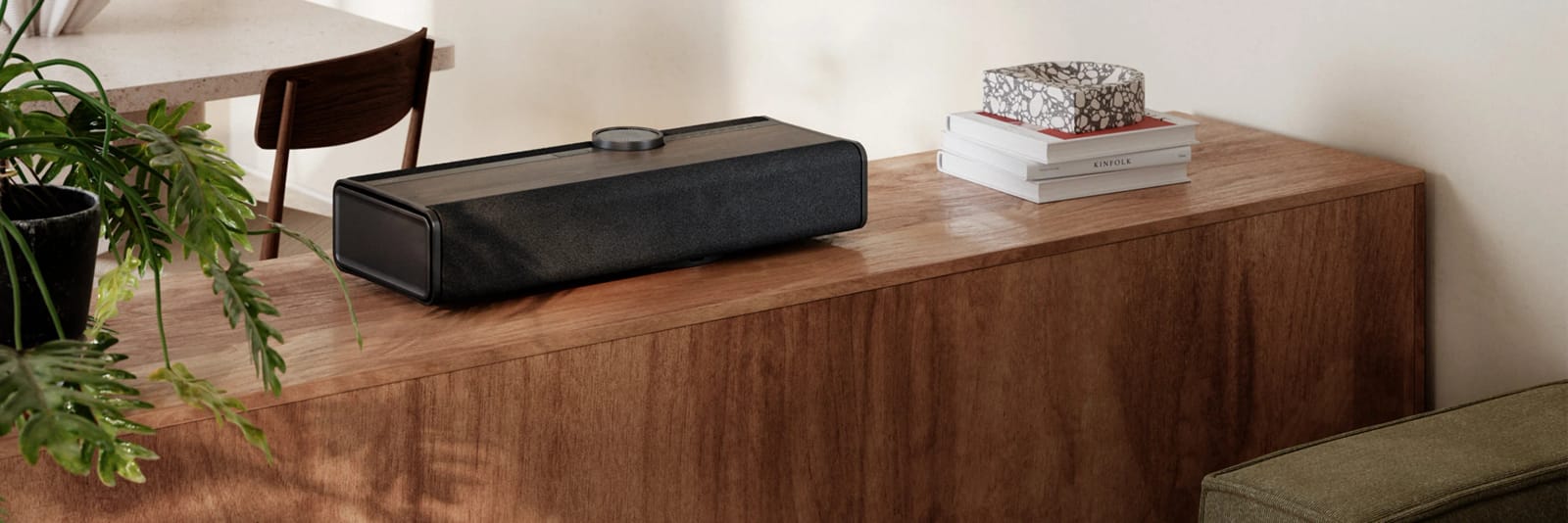 Vega wireless speaker on a sideboard