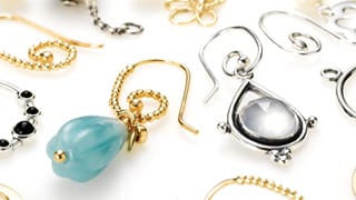 Compose hoops and pendants in silver and gold