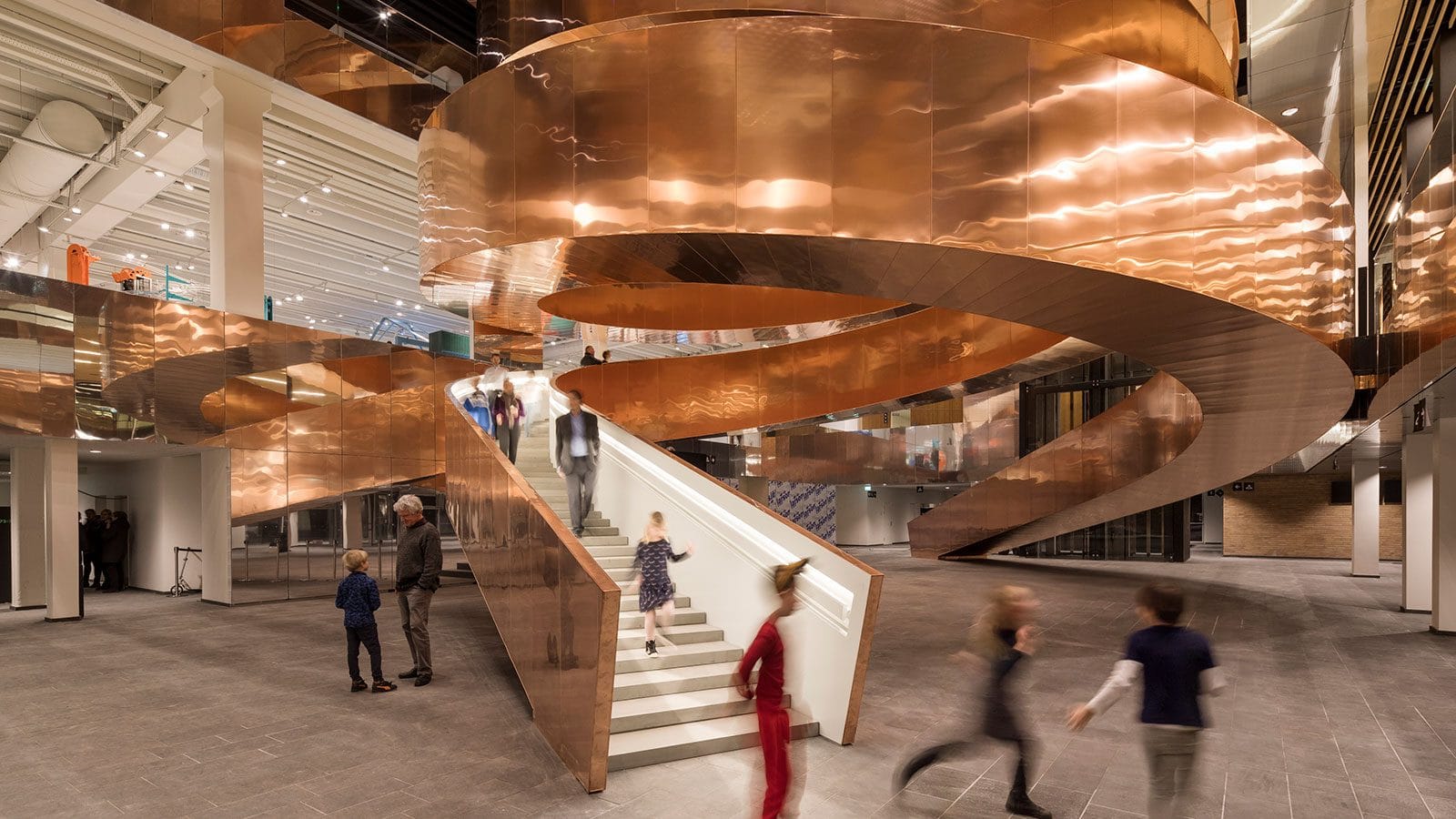 The copper-clad helix staircase in the entrance hall
