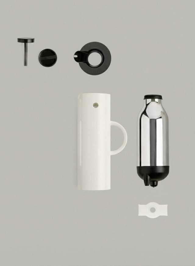 The jug taken apart: body, glass insert, stopper and lid