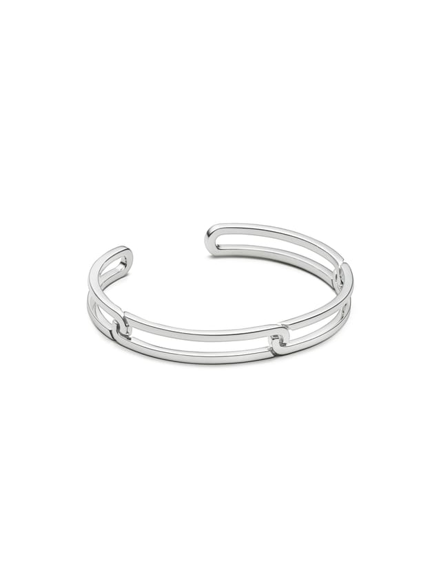 An open bracelet in sterling silver