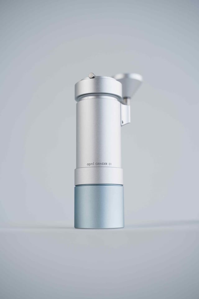 The April 01 Hand Grinder, all metal, on a grey ground
