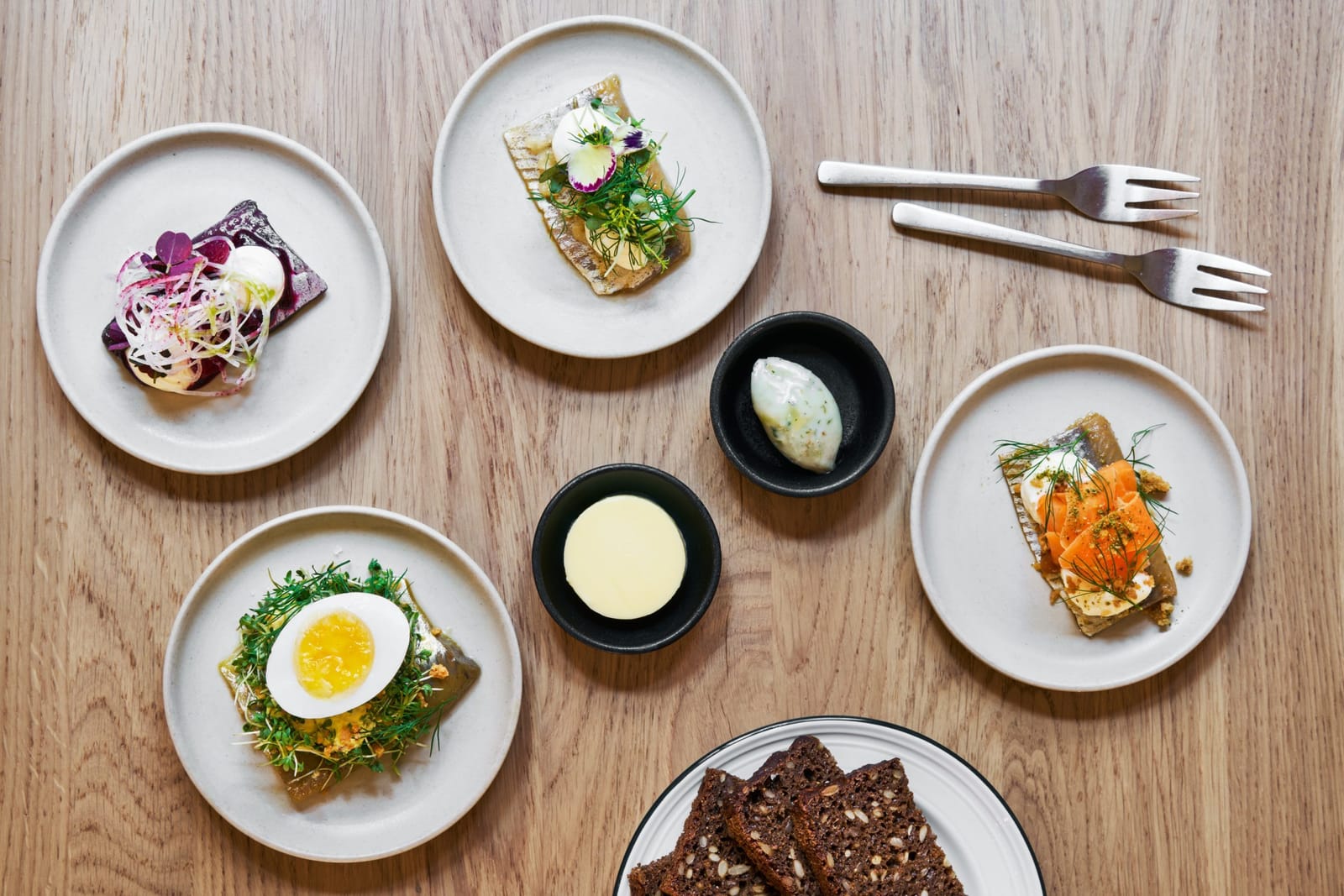 Pieces of smørrebrød on herring and rye