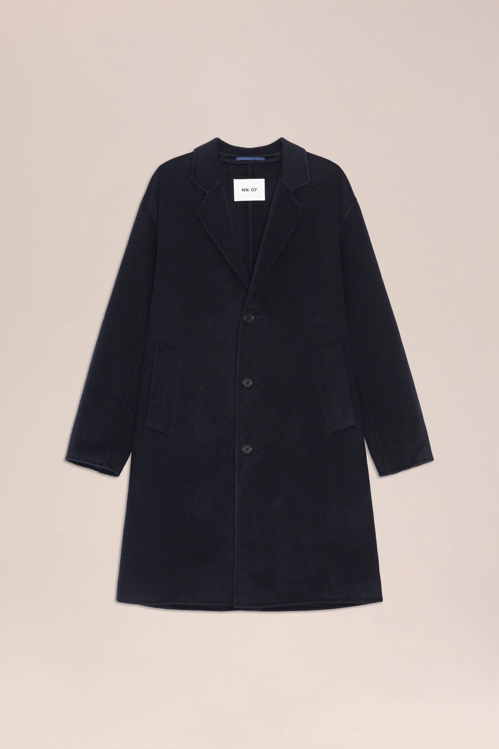 Kendrick coat in navy blue, laid flat