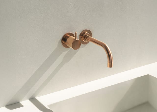 Wall-mounted VOLA mixer and spout in copper