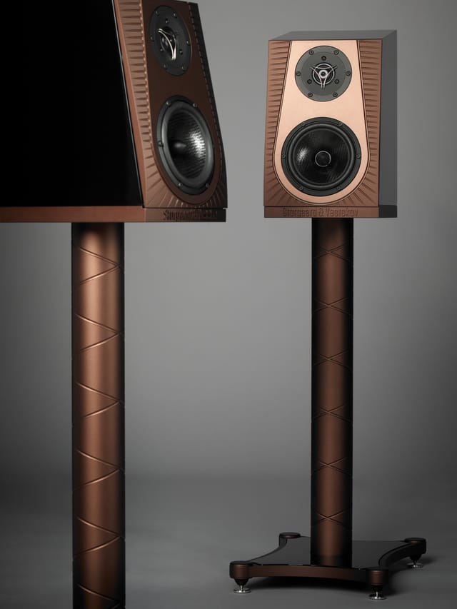 A pair of Frida speakers in copper on their stands