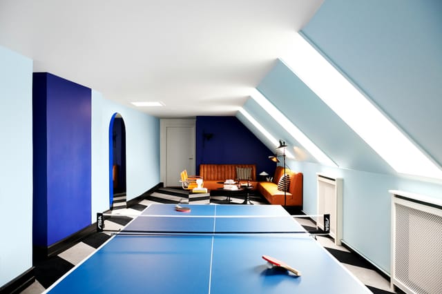 The games room under the roof, with its ping-pong table