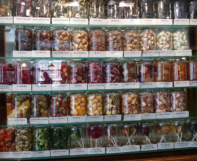 Jars of boiled sweets on the shop shelves
