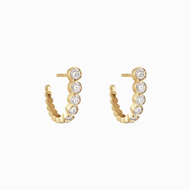 Gold hoop earrings set with diamonds