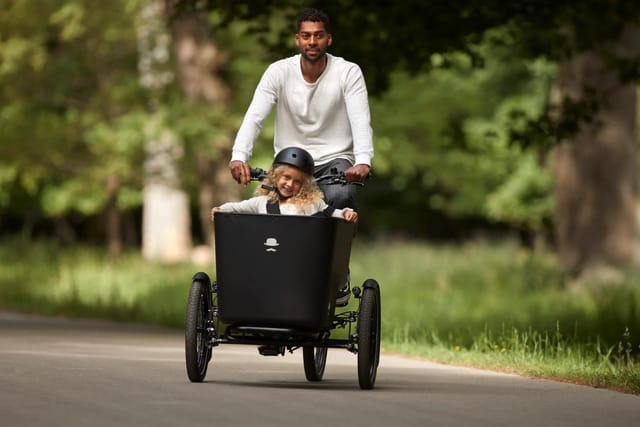 The MK1-E from the front, with a child in the box