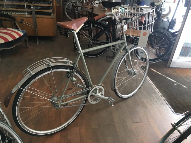 A grey men's Old Shatterhand with a rack, in the shop