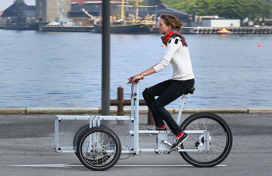 An XYZ Cargo trike ridden along the Copenhagen harbour